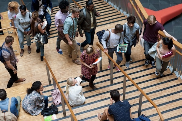 students on stairs at a UK university